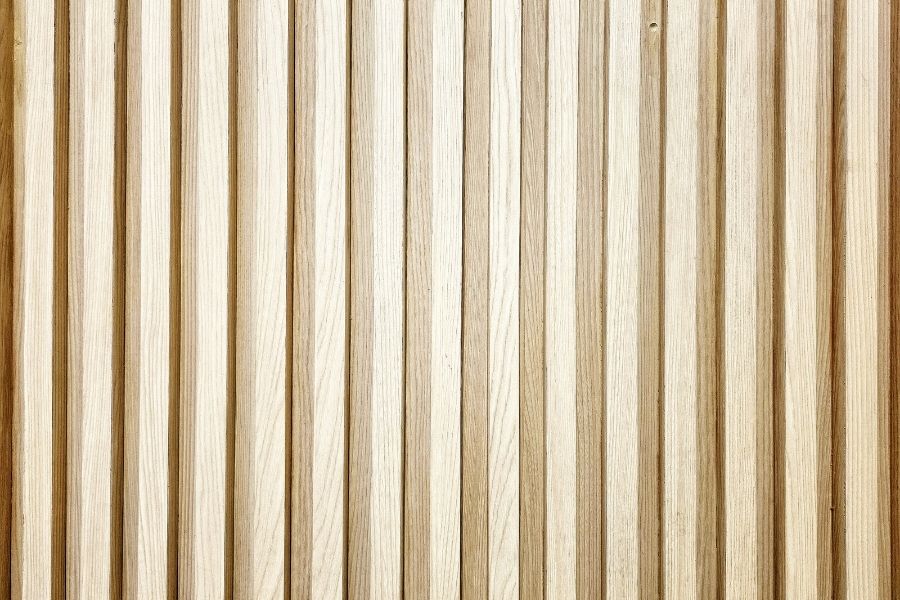 Brown Timber Battens Wall Background with Spotlight and Shadow.