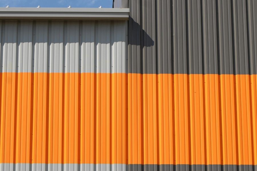 Industrial Building with Orange and Gray metal Siding